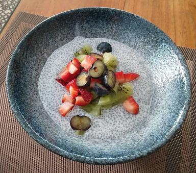 Chia Fruits Bowl (Chia pudding in Soy milk , Almond Milk , Coconut milk with fresh fruits on topped and some Granola) VEGAN FOOD